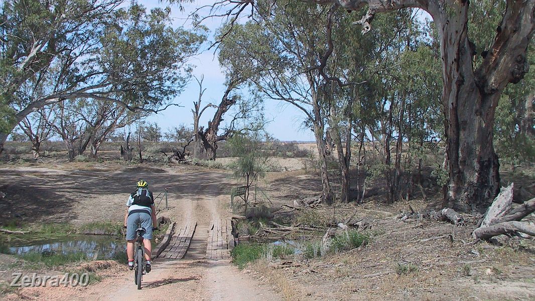 29-Heidi takes bridge across Mularoo Creek on Lindsay Island.JPG